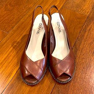 Peep toe brown leather heel size 7 1/2. Excellent condition beautifully made